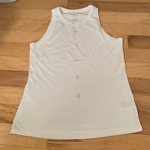 White cutoff Nike tee. No stains, it’s in great condition!
